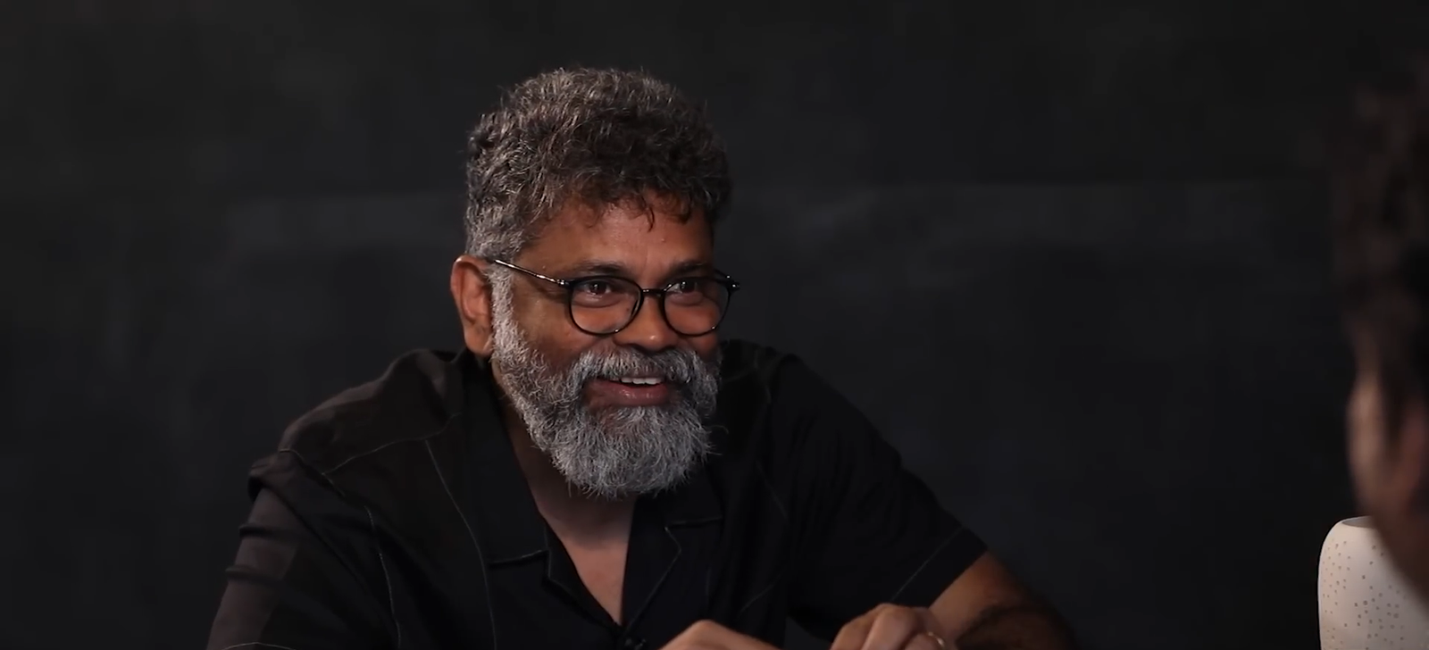 Director Sukumar on a movie set, the visionary behind the unique Sukumar Direction Style in Tollywood