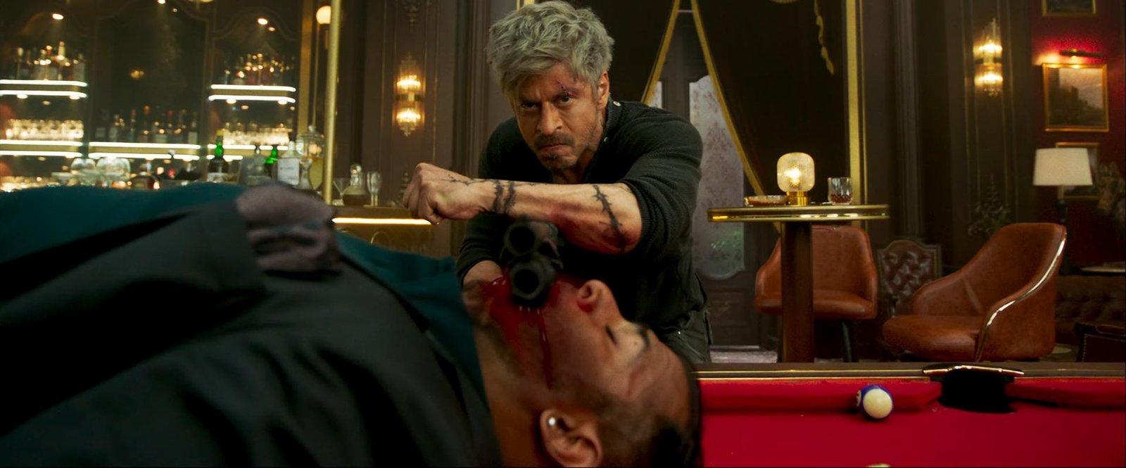 SRK King Movie 2026 official poster featuring SRK in a rugged assassin look.