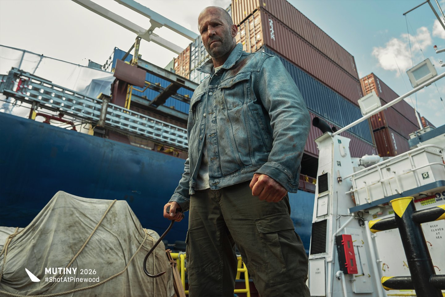 Commercial cargo ship at sea in Jason Statham Mutiny.