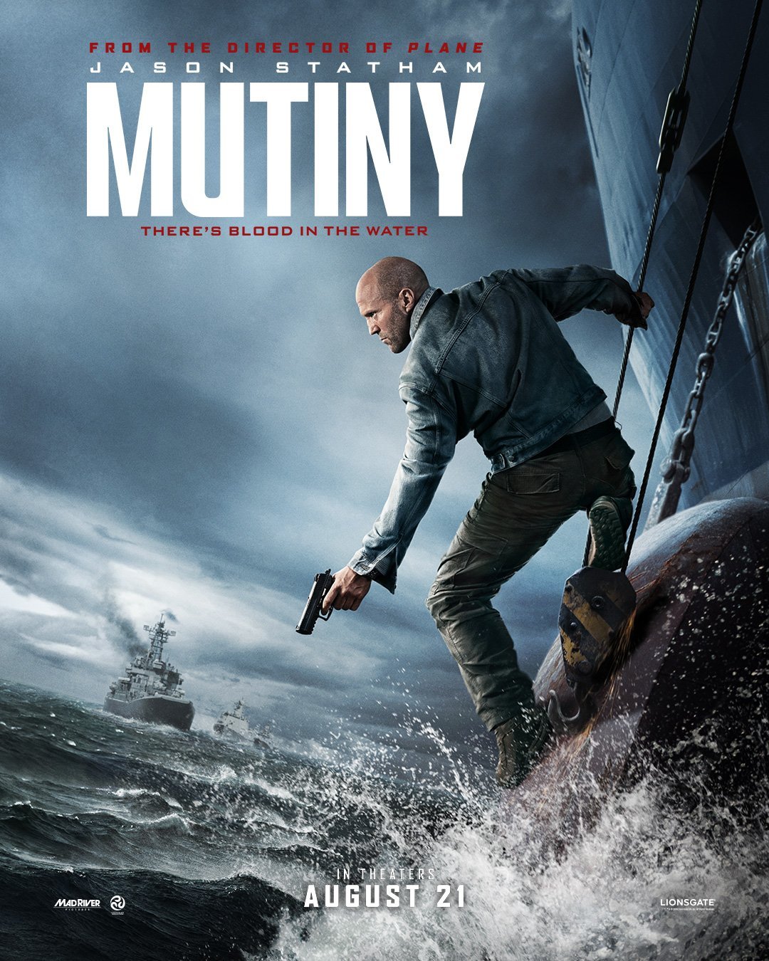  Jason Statham as Cole Reed looking intensely into the distance, establishing the core narrative fueling the Jason Statham Mutiny plot.